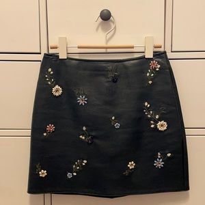Zara deep green mini faux leather flower skirt